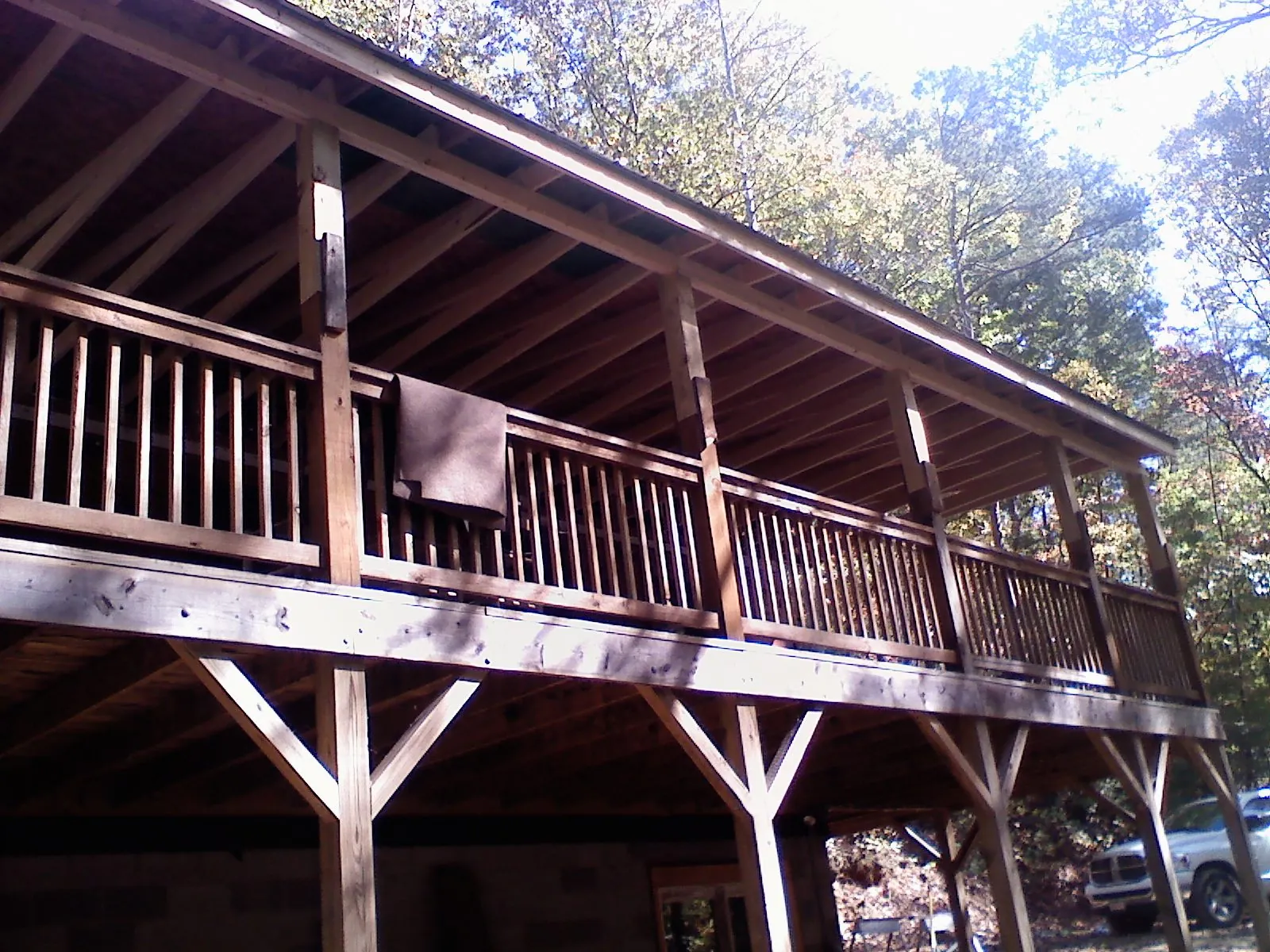 Timber framing under a new elevated porch and deck — Roof Leak Repair in Redondo Beach by Roofing Brothers